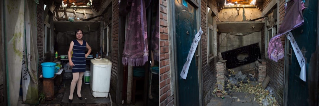 2017年8月17日,張小姐站在屋外與鄰居們共用的廚房中為家人做飯。