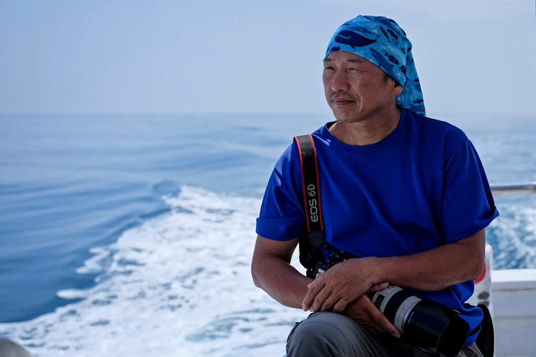 2010年9月,柯金源在花莲赏鲸船上。